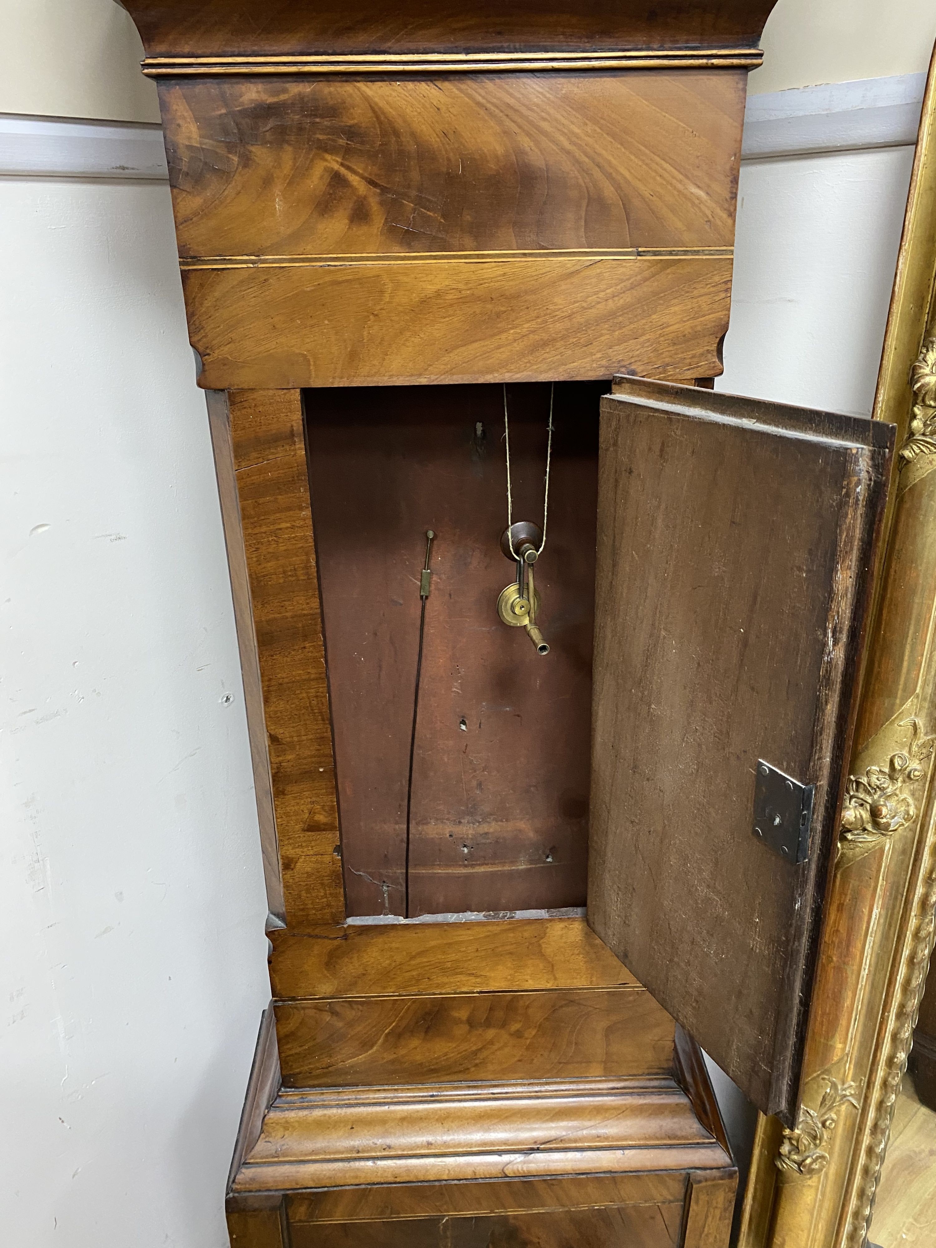 An early 19th century mahogany eight day longcase clock (reduced in height) marked Drayton, height 203cm